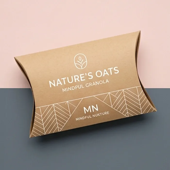Kraft pillow box with a fine geometric line pattern and a natural oats label