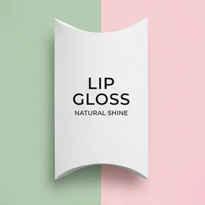 White lip gloss pillow box with a minimal natural shine wordmark