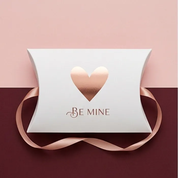 White Valentine pillow box with a blush heart and a satin ribbon