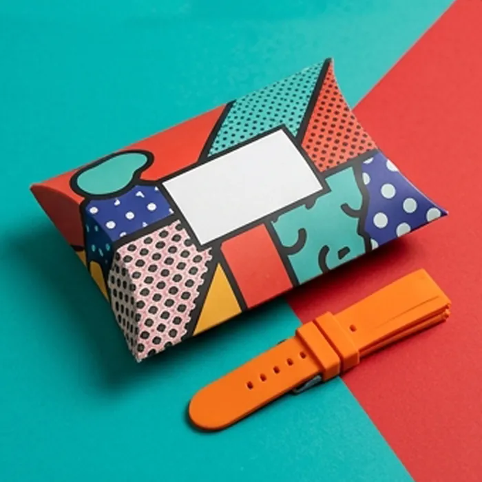 Bright patterned watch strap pillow box with a printed panel and a strap